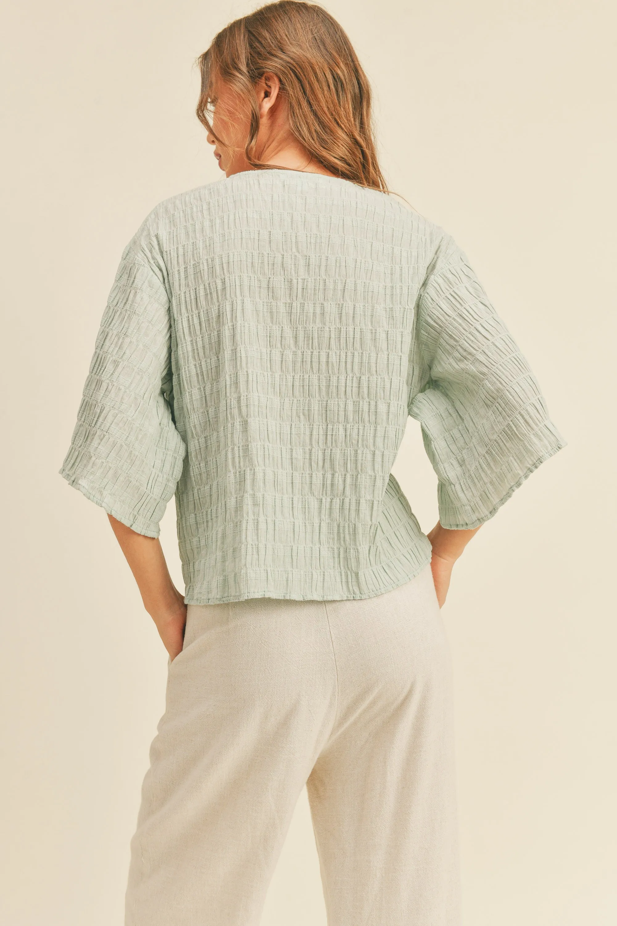 Textured tie front blouse
