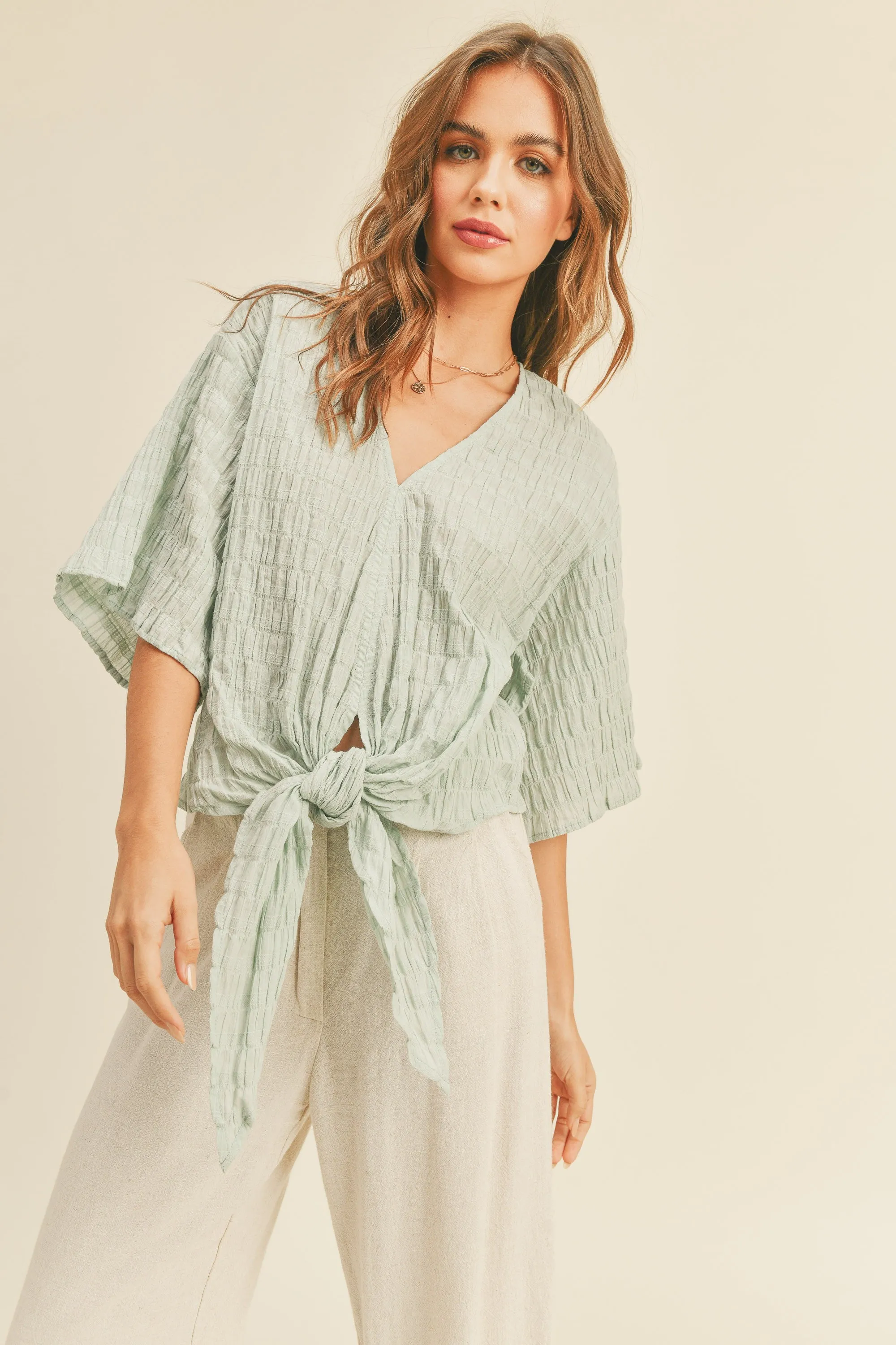Textured tie front blouse